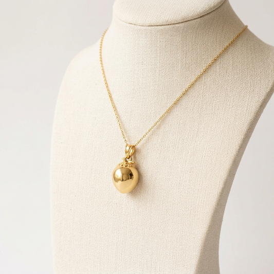 Pendentif Noix de Coco sur un buste en lin ivoire