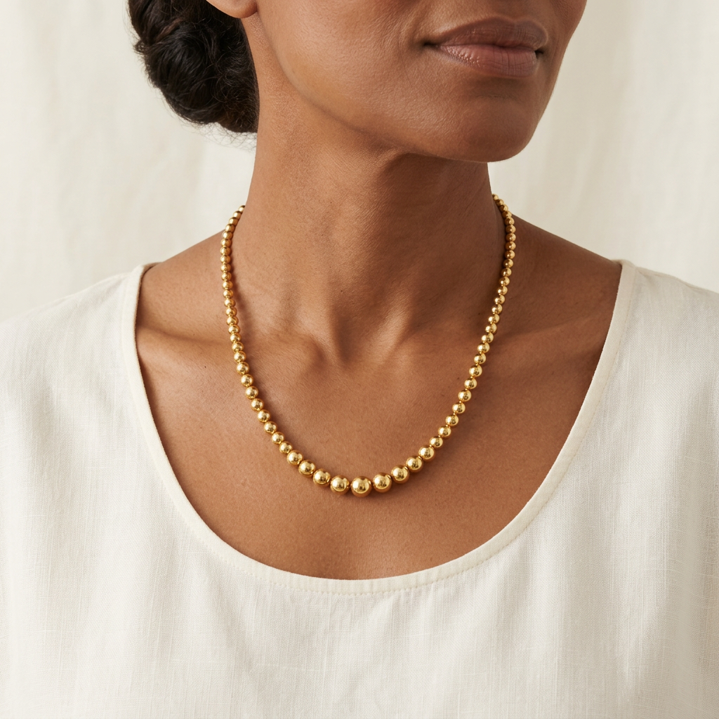 Collier Boules Dégradées en plaqué or porté